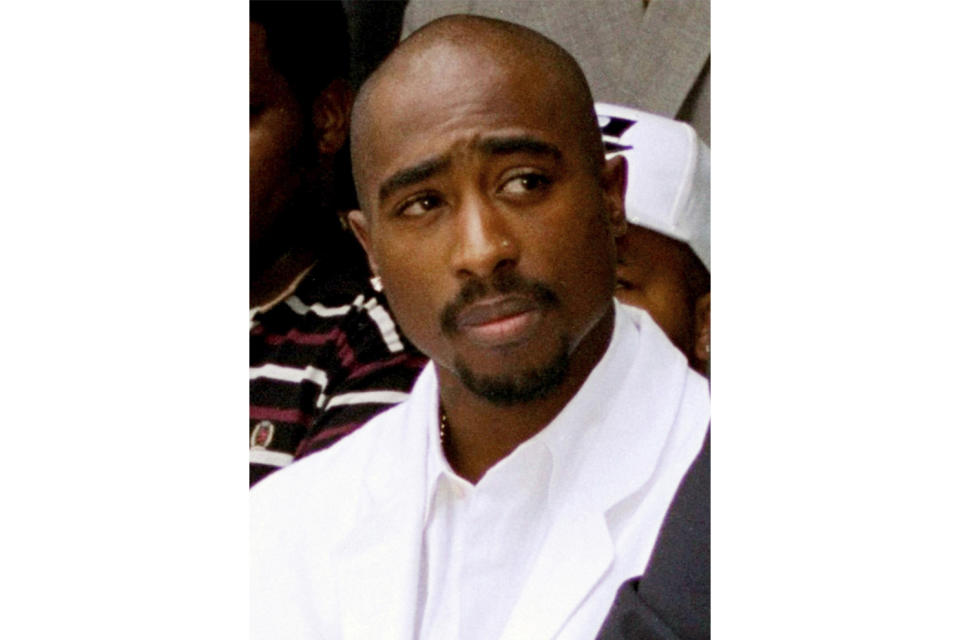 FILE - Rapper Tupac Shakur attends a voter registration event in South Central Los Angeles, Aug. 15, 1996. Authorities in Nevada confirmed Tuesday, July 18, 2023, that they served a search warrant this week in connection with the long-unsolved killing of the late rapper Shakur. (AP Photo/Frank Wiese, File)