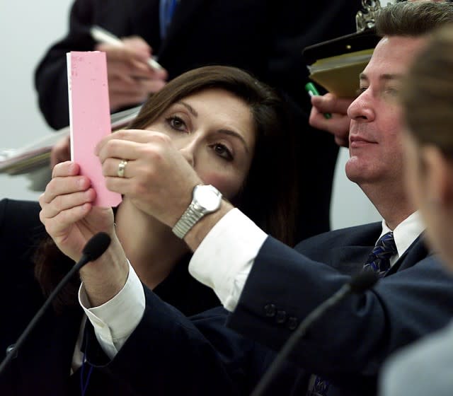 Election canvassers in Miami check questionable ballots in 2000, during the presidential recount.