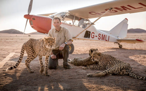 Professor Alan Wilson with the plane he built to monitor cheetahs - Credit: BBC