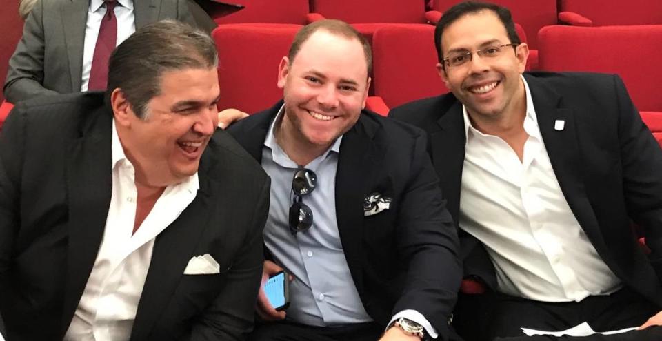 Three leaders of Miami-Dade Mayor Carlos Gimenez’s 2016 reelection campaign share a light moment before the swearing in of Miami Gardens Mayor Oliver Gilbert as the new chairman of the Transportation Planning Organization on Feb. 21, 2019. From left to right are Ralph Garcia-Toledo, who was Gimenez’s volunteer finance chairman; Brian Goldmeier, the hired fund-raiser for the 2016 race; and Jesse Manzano-Plaza, the campaign manager. Garcia-Toledo and Manzano-Plaza are part of a proposal by Genting to build and operate a county monorail system. Garica-Toledo and Manzano-Plaza are part of the group pursuing a monorail project in Miami-Dade.