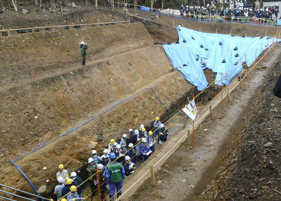 Japanese nuclear regulators inspect ground structures at the Ohi nuclear power plant to examine if an existing fault line is active, in Ohi, Fukui prefecture, western Japan, Friday, Nov. 2, 2012. The inspection determines whether the plant should close. Its No. 3 and No. 4 reactors went back online in July, becoming Japan's only operating reactors after all 50 Japanese reactors went offline for inspection following the March 11, 2011, crisis at Fukushima Dai-ichi. (AP Photo/Kyodo News) JAPAN OUT, MANDATORY CREDIT, NO LICENSING IN CHINA, FRANCE, HONG KONG, JAPAN AND SOUTH KOREA