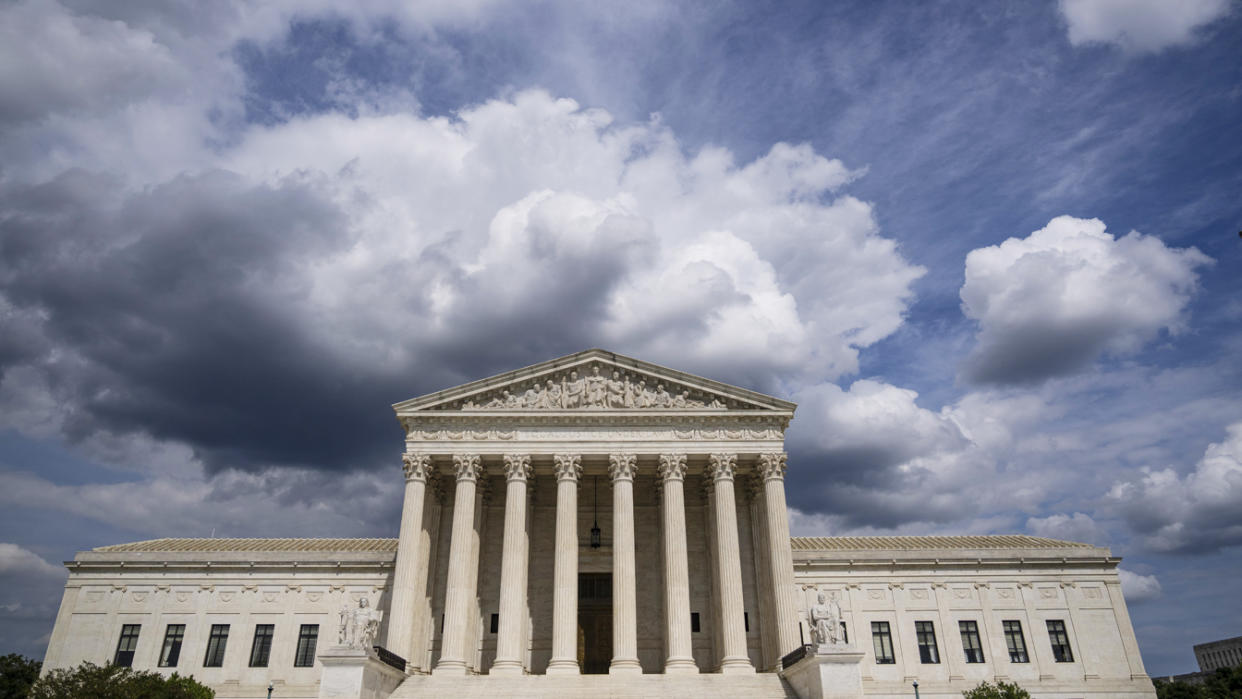 Clouds are seen above The U.S. Supreme Court building on May 17, 2021 in Washington, DC. The Supreme Court said that it will hear a Mississippi abortion case that challenges Roe v. Wade. They will hear the case in October, with a decision likely to come in June of 2022. (Photo by Drew Angerer/Getty Images)