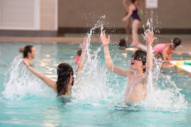 Children play in swimming pool