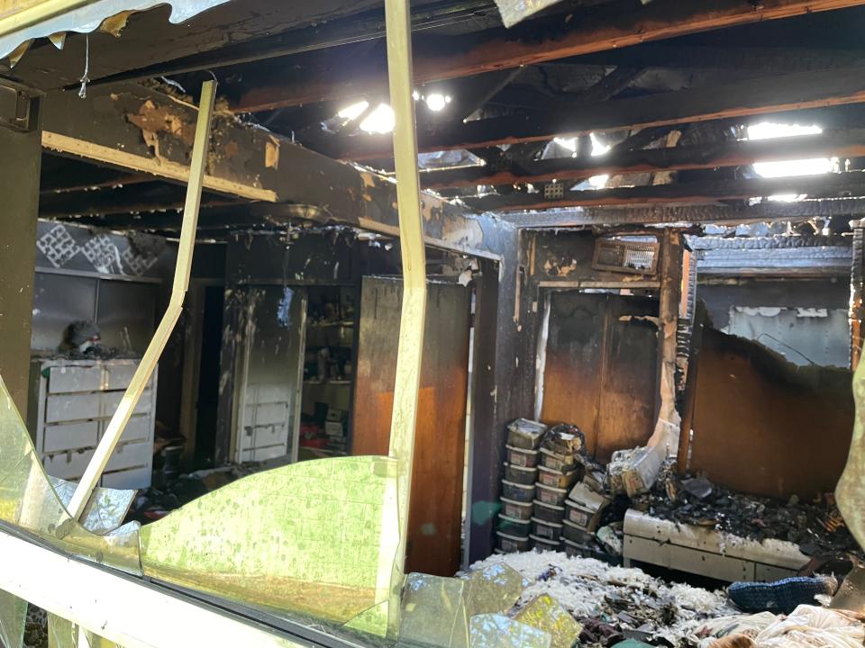 A look at what's left of Constance Belvin's home, which was severely damaged by fire Friday night. Belvin, who was removed from the home by firefighters, died at a local hospital.