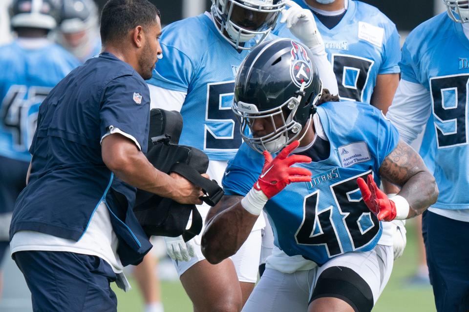 Tennessee Titans outside linebacker Bud Dupree (48) runs through drills during practice at Saint Thomas Sports Park Tuesday, June 14, 2022, in Nashville, Tenn. 