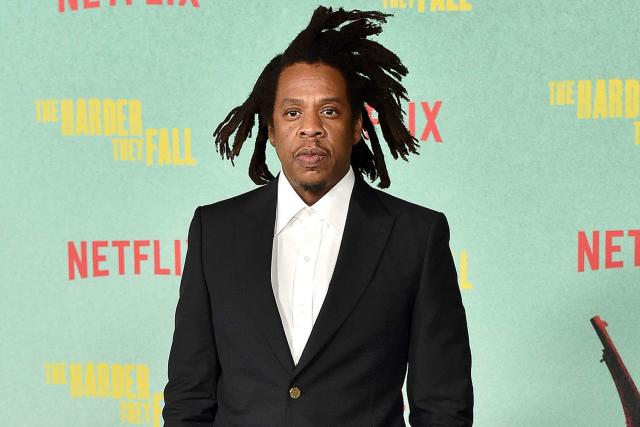 Him His of by a Watch Fist Champagne Instead Fan of JAY-Z Glass — Giving Shocks Bump