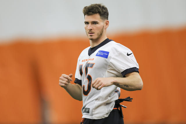 Cincinnati Bengals' Charlie Jones stretches on the field at the NFL football team's rookie minicamp in Cincinnati, Friday, May 12, 2023. (AP Photo/Aaron Doster)