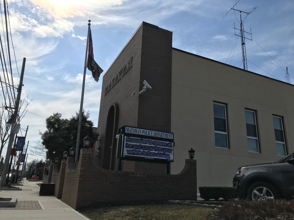 American and POW-MIA flags fly outside Matawan police headquarters on March 14, 2019.