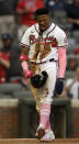 Atlanta Braves' Ronald Acuna Jr. reacts after scoring against the Philadelphia Phillies in the first inning of a baseball game Sunday, May 9, 2021, in Atlanta. Acuna scored on a single by Braves' Freddie Freeman. (AP Photo/Ben Margot)