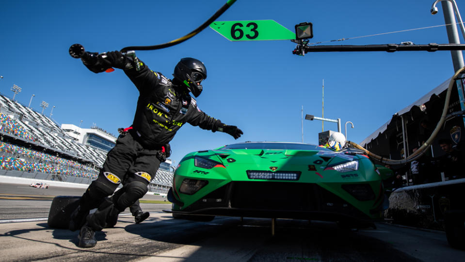 A momentary pit stop for car No. 63, one of the Iron Lynx team's Lamborghini Huracán GT3 EVO2 entries in the 2023 Rolex 24 at Daytona.