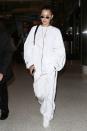 <p>In head-to-toe white pairing baggy track pants with an over-sized pullover, sneakers and small circular shades while out in LA. </p>