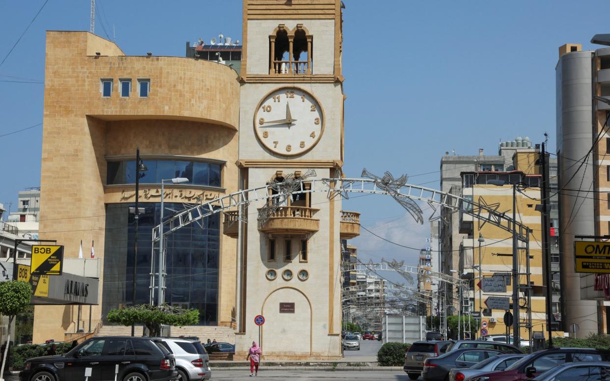 A clock tower indicates the time in Jdeideh after the government announced a decision to delay daylight saving - Mohamed Azakir/Reuters