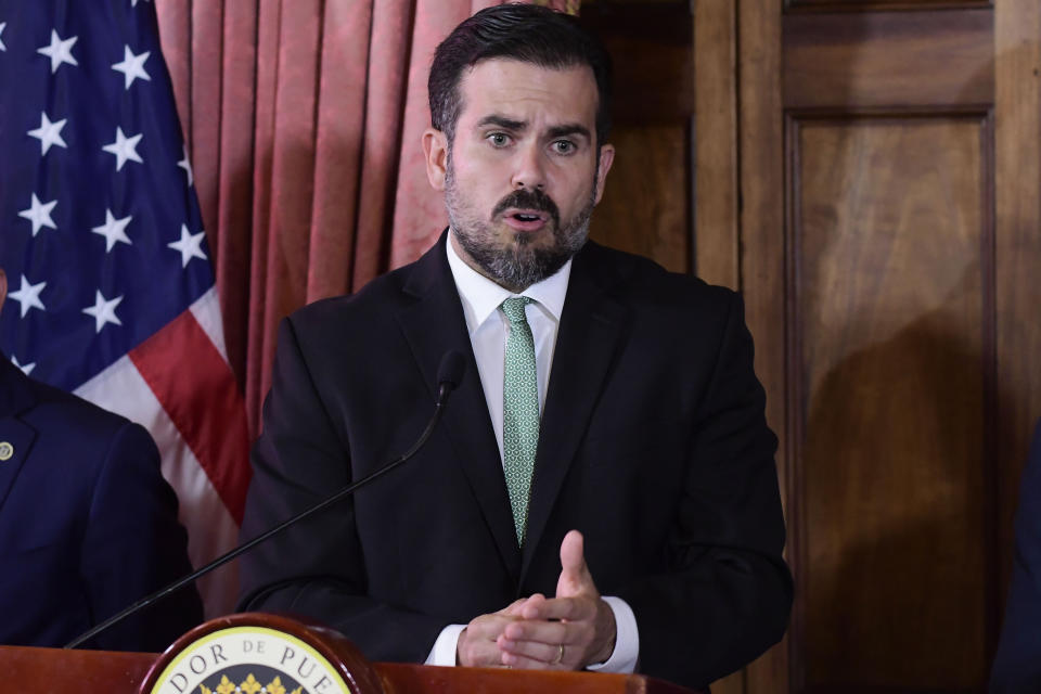 Puerto Rico Gov. Ricardo Rossello speaks during a press conference in La Fortaleza's Tea Room, in San Juan, Puerto Rico, Tuesday, July 16, 2019. Rossello summoned the press a few hours after a riot took place near the executive mansion, where protesters demanded Rossello step down after a leak of profanity-laced and at times misogynistic online chat with nine other male members of his administration. (AP Photo/Carlos Giusti)