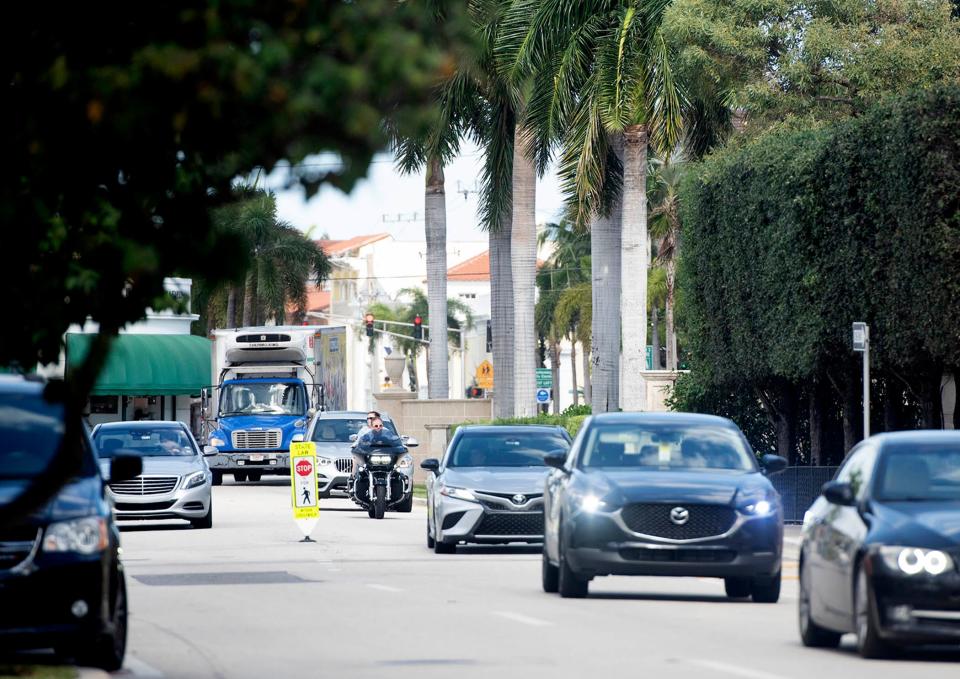 Traffic heads south on South County Road near Palm Beach Town Hall on Wednesday.