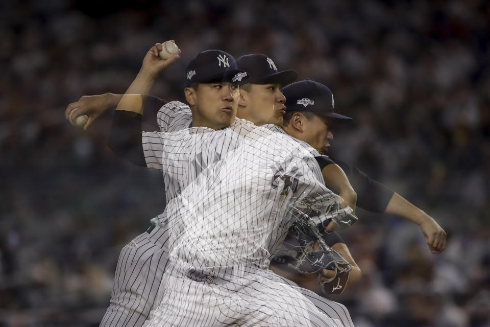 In this multiple exposure image, New York Yankees starting pitcher Masahiro Tanaka delivers against the Minnesota Twins during the fifth inning of Game 2 of an American League Division Series baseball game, Saturday, Oct. 5, 2019, in New York. (AP Photo/Frank Franklin II)