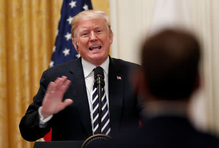 U.S. President Donald Trump answers a question about the nomination of Judge Brett Kavanaugh to the U.S. Supreme Court and allegations of sexual assault against Kavanaugh during a joint news conference with Poland's President Andrzej Duda in the East Room of the White House in Washington, U.S., September 18, 2018. REUTERS/Kevin Lamarque