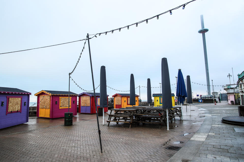 General view of stacked benches outside the closed Brighton Music Hall on Brighton seafront, as the UK continues in lockdown due to the coronavirus pandemic. Picture date: Friday February 5, 2021.