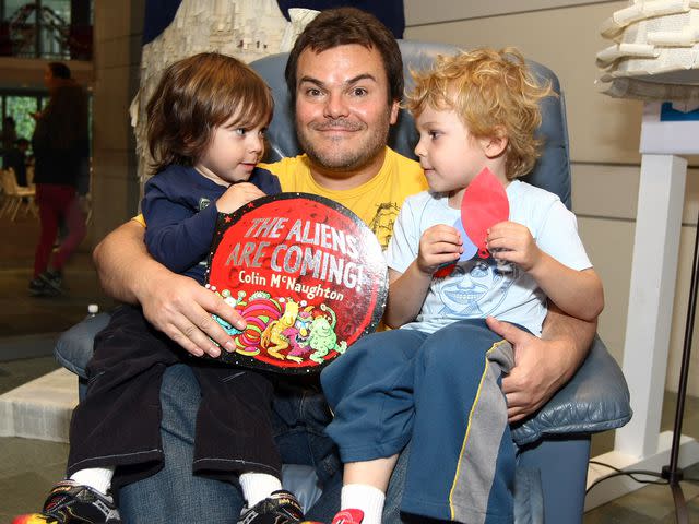 <p>Neilson Barnard/WireImage</p> Jack Black and his sons Thomas and Samuel attend the Milk + Bookies Second Annual Reading Room on March 20, 2011 in Los Angeles, California.