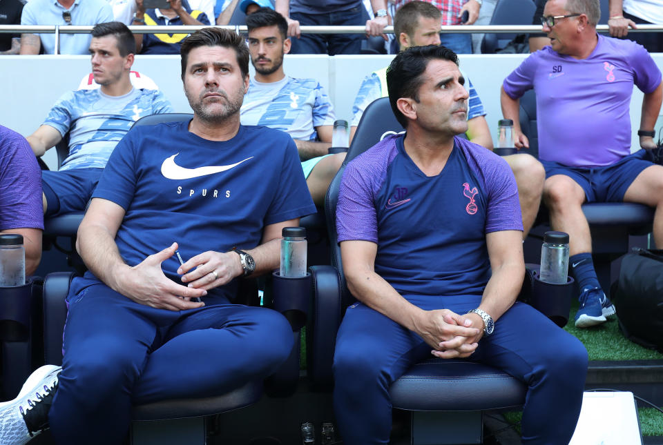 LONDON, ENGLAND - AUGUST 25: Mauricio Pochettino, Manager of Tottenham Hotspur and assistant Jesus Perez during the Premier League match between Tottenham Hotspur and Newcastle United at Tottenham Hotspur Stadium on August 25, 2019 in London, United Kingdom. (Photo by Tottenham Hotspur FC/Tottenham Hotspur FC via Getty Images)