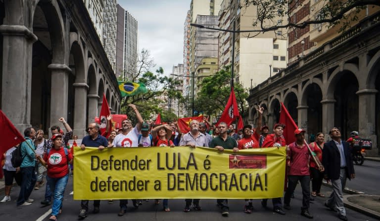 Protesters march in Porto Alegre, southern Brazil, in defense of democracy and Lula's right to be a candidate in the October 2018 presidential election