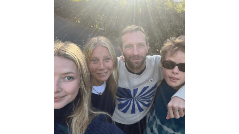 Photo shared by Gwyneth Paltrow on Instagram in honor of Father's Day of her and Chris Martin with their kids Apple and Moses