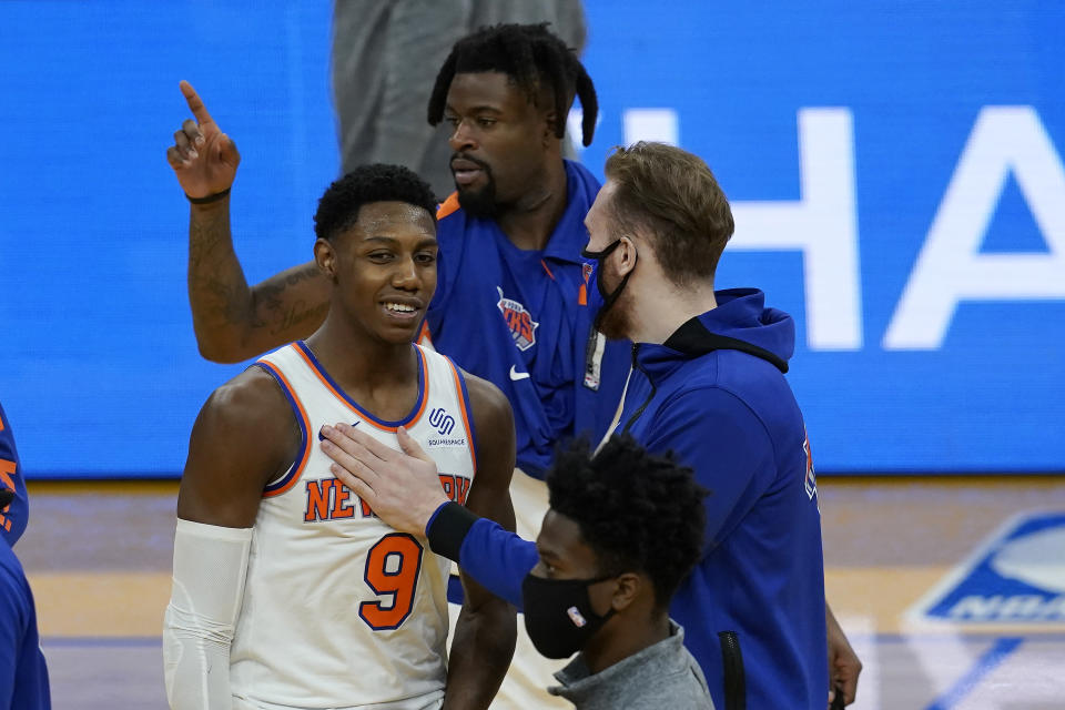 New York Knicks guard RJ Barrett (9) celebrates with teammates after the Knicks defeated the Golden State Warriors in an NBA basketball game in San Francisco, Thursday, Jan. 21, 2021. (AP Photo/Jeff Chiu)