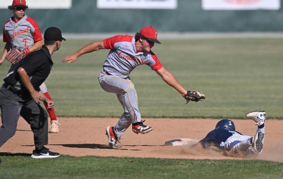 Centennial’s Brady Self, center, makes the play at second against Bullard’s Keynen Gomez, right, in the Central Section DI baseball quarterfinal Friday, May 19, 2023 in Fresno. Centennial won 6-2.
