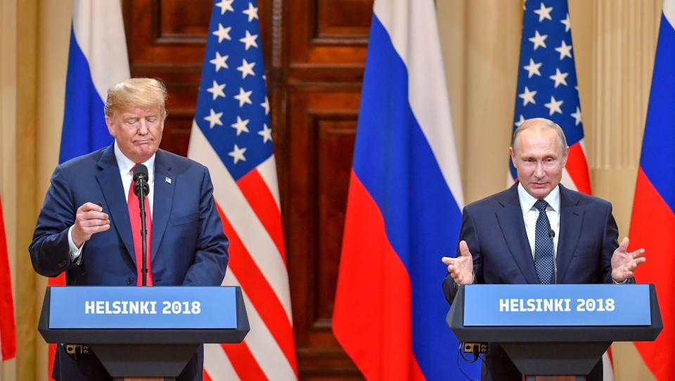 <p>U.S. President Donald Trump and Russia’s President Vladimir Putin attend a joint press conference after a meeting at the Presidential Palace in Helsinki, on July 16, 2018. (Photo: Yuri Kadobnov/AFP/Getty Images) </p>