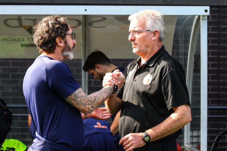Boro boss Jono Greening shakes hands with Gloucester boss Tim Flowers. (Photo: Zach Forster)