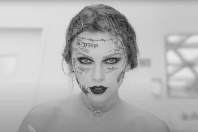 <p>Taylor Swift/ Youtube</p> Taylor Swift with tattoos in "Fortnight" music video