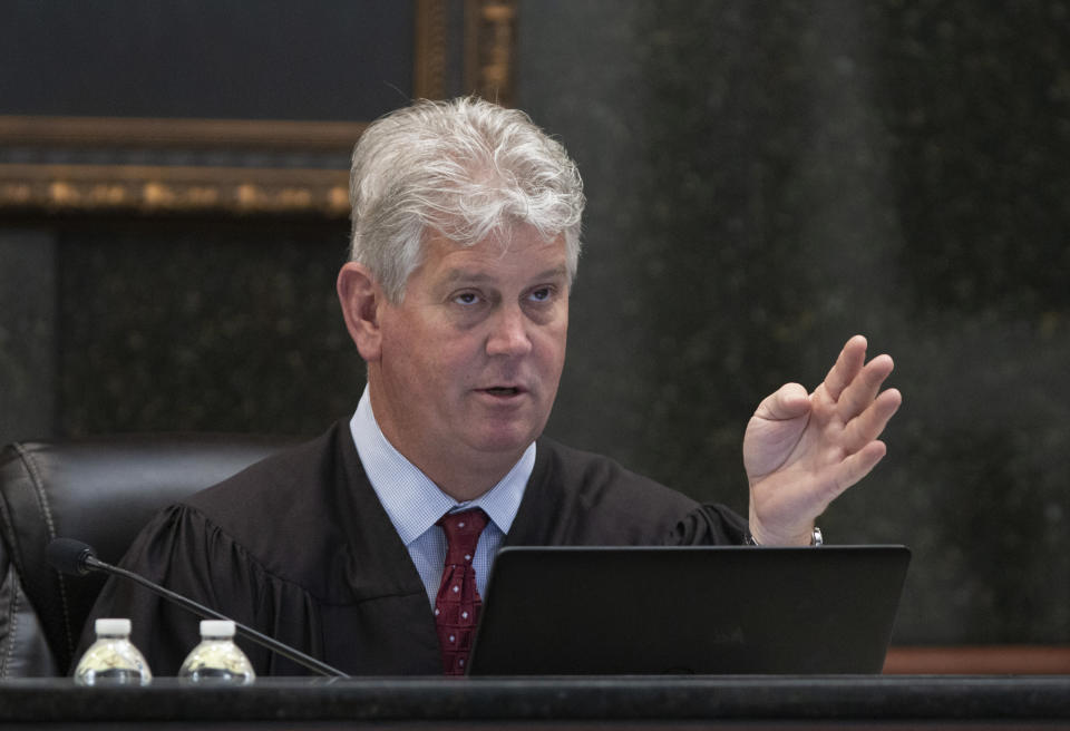 State Judge Eugene Griffith talks to attorneys during the trail of Timothy Jones Jr. in Lexington, S.C., Wednesday, May 22, 2019. Lawyers defending Jones turned Wednesday to brain science in an effort to spare their client from the death penalty. (Tracy Glantz/The State via AP, Pool)