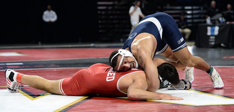 Penn State's Aaron Brooks, top, wrestles against Nebraska's Silas Allred in the semifinals at 197 pounds during the Big Ten championships on Saturday, March 9, 2023, in College Park, Md. Brooks won by major decision, 14-2.