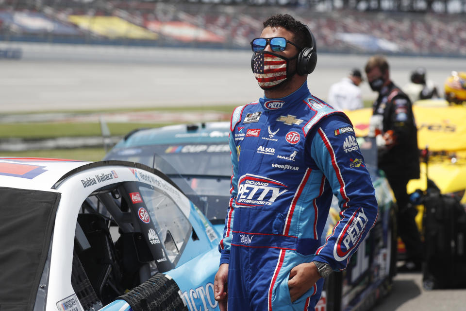 Driver Bubba Wallace prior to the start of the NASCAR Cup Series at the Talladega Superspeedway in Talladega, Ala., Monday, June 22, 2020. (AP Photo/John Bazemore)