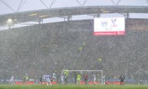 Soccer Football - Premier League - Huddersfield Town vs Crystal Palace - John Smith's Stadium, Huddersfield, Britain - March 17, 2018 General view of the action as the snow falls REUTERS/Peter Powell