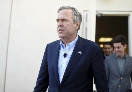 Republican U.S. presidential candidate Jeb Bush walks to his bus after speaking at a campaign event in Greenville, South Carolina February 19, 2016. REUTERS/Rainier Ehrhardt