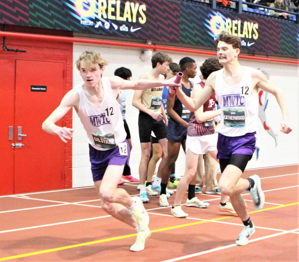 Monroe-Woodbury's Gavin Catherwood (r) hands the baton to Collin Gilstrap during the boys championship 4x800 relay at Nike Indoor Nationals March 12, 2023.