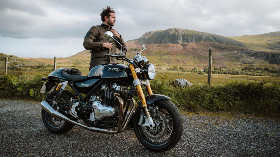 Journalist Charlie Thomas readies himself for the Norton Commando.