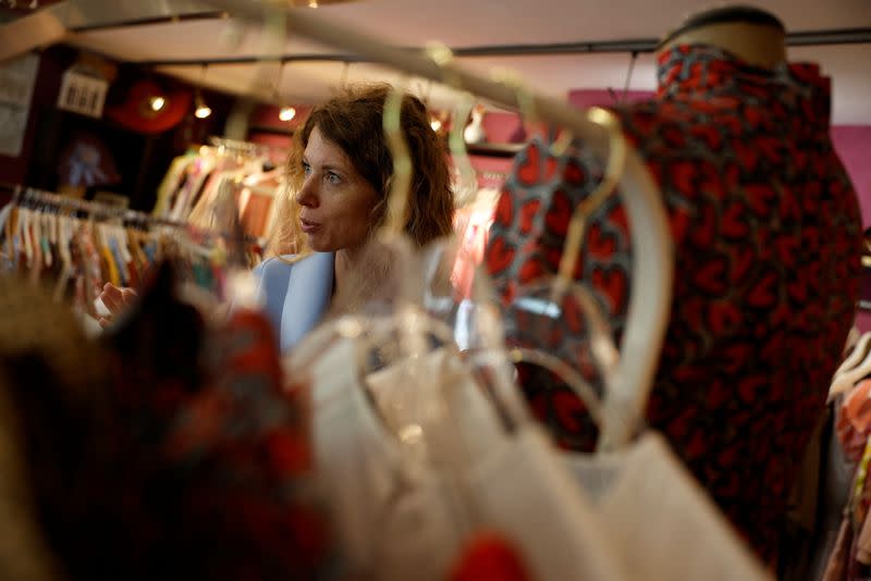 Ukrainian fashion designer from Kyiv sells her creations which represent her national culture, in Madrid