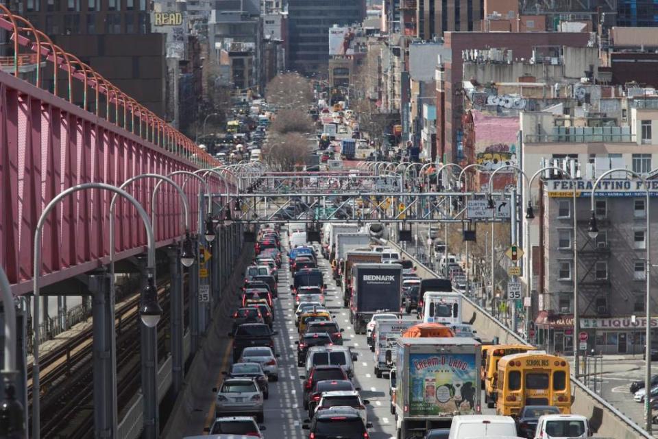 In this March 28, 2019 photo, traffic makes its way into Manhattan from Brooklyn over the Williamsburg Bridge in New York. (AP Photo/Mary Altaffer)