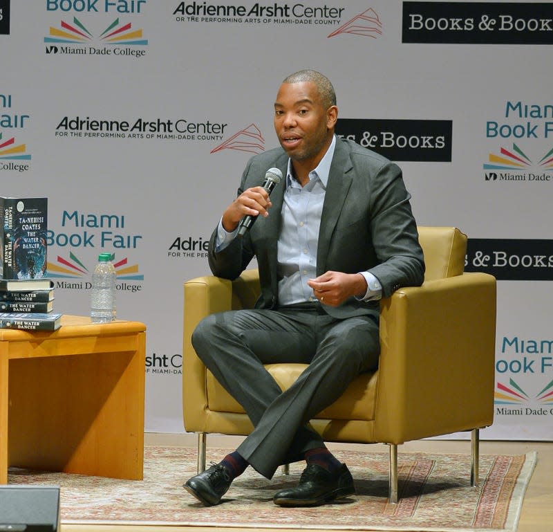 MIAMI, FL - NOVEMBER 04: An Evening With Author Ta-Nehisi Coates in conversation with Elliott Jones about Ta-Nehisi Coates new book “THE WATER DANCER” presented by Books & Books in collaboration with Miami Book Fair at the Adrienne Arsht Center for the Performing Arts on November 4, 2019 in Miami, Florida. 