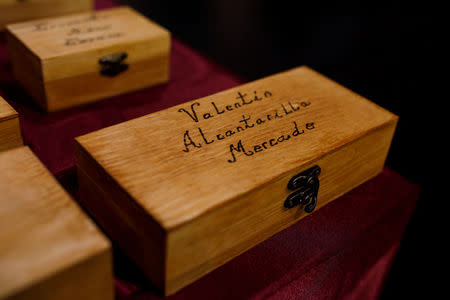 A box that contains personal effects of Valentin Alcantarilla Mercado who was shot in 1940 by forces of dictator Francisco Franco is seen during a ceremony to delivery of the remains of 22 people who were shot between 1939 and 1940 by forces of dictator Francisco Franco in Guadalajara, Spain, May 19 , 2018. REUTERS/Juan Medina