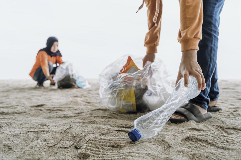 Environmental consciousness has gained traction in Muslim communities over recent years. <a href="https://www.gettyimages.co.uk/detail/photo/mother-and-daughter-cleaning-up-a-beach-royalty-free-image/1432295674?phrase=islam%20ecology&adppopup=true" rel="nofollow noopener" target="_blank" data-ylk="slk:Yasser Chalid via Getty Images;elm:context_link;itc:0;sec:content-canvas" class="link ">Yasser Chalid via Getty Images</a>