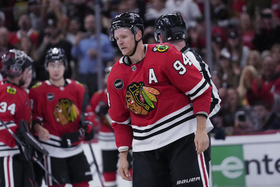 Chicago Blackhawks right wing Corey Perry heads to the penatly box on a roughing penalty on St. Louis Blues defenseman Hunter Skinner during the second period of a preseason NHL hockey game Thursday, Sept. 28, 2023, in Chicago. (AP Photo/Erin Hooley)