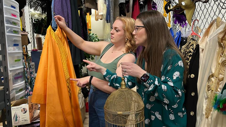 Sarah Beckham-Turner, right, and recent graduate Chloe Ridolfo pick out props and costumes for possible use with Manhattan Opera Studio's upcoming staging of "The Magic Flute." Beckham-Turner, director of WT Opera, will direct the MOS production, and five of her current and former students will attend the workshop and perform in it.