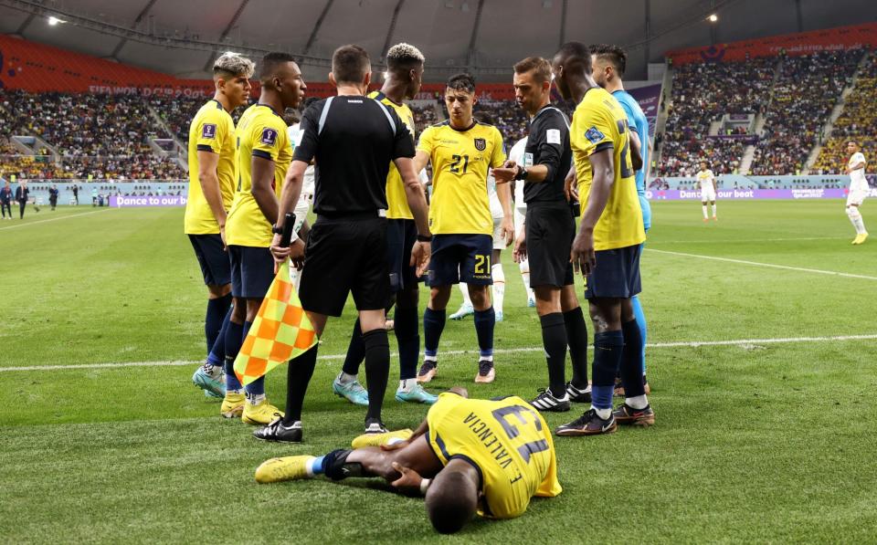 Enner Valencia of Ecuador goes down with an injury during the FIFA World Cup Qatar 2022 Group A match between Ecuador and Senegal at Khalifa International Stadium - Buda Mendes/Getty Inages
