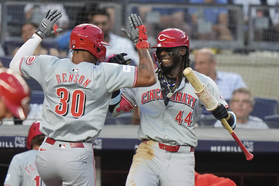 Cincinnati Reds' Will Benson (30) celebrates with Elly De La Cruz (44) after hitting a two-run home run during the fifth inning of a baseball game against the New York Yankees, Tuesday, July 2, 2024, in New York. (AP Photo/Frank Franklin II)