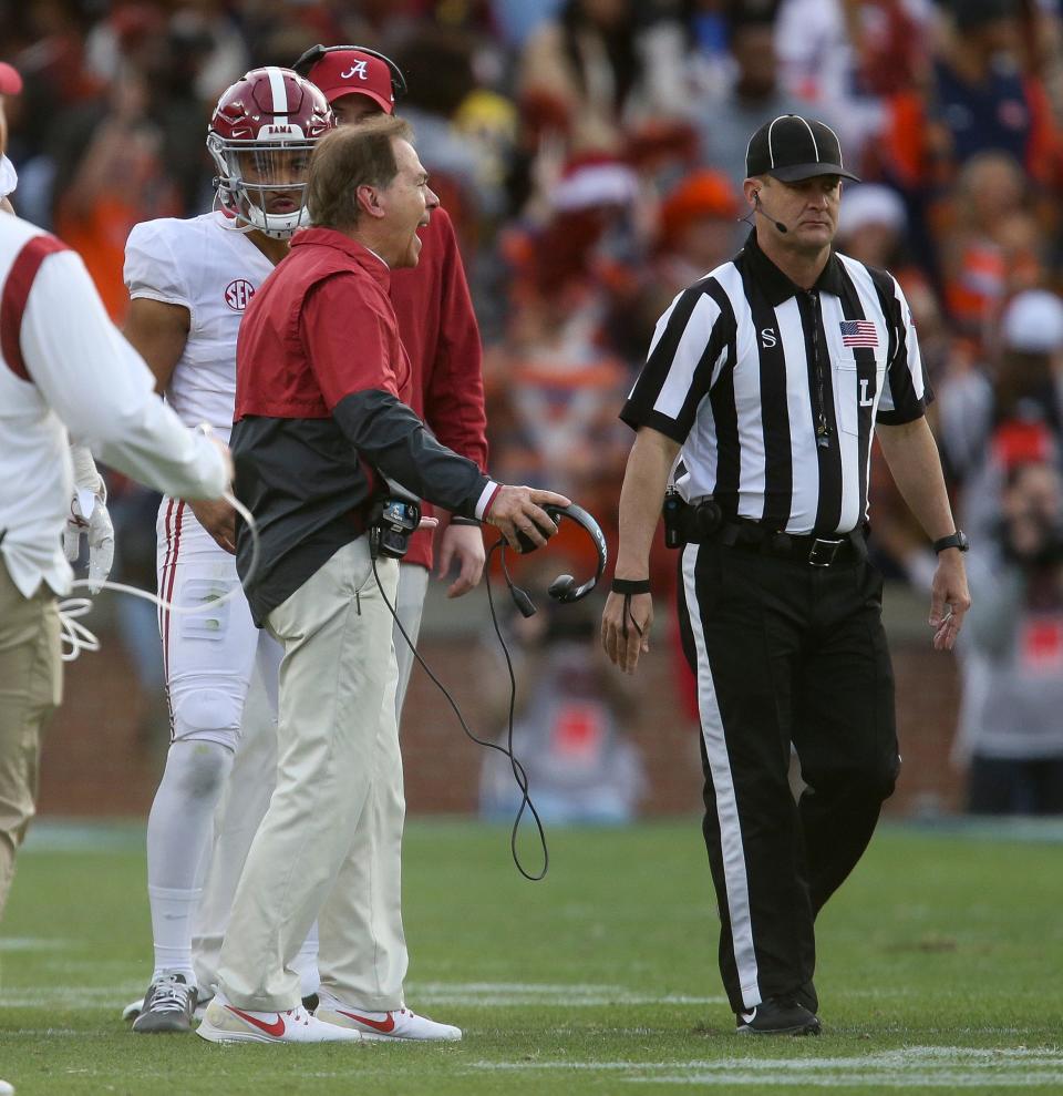 Nov 27, 2021; Auburn, Alabama, USA;  Alabama Head Coach Nick Saban protests a no call on what he thought should have been a pass interference against Auburn at Jordan-Hare Stadium. Mandatory Credit: Gary Cosby Jr.-USA TODAY Sports