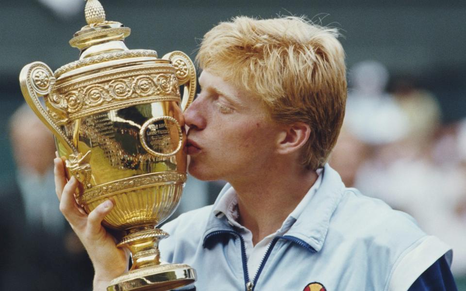 Boris Becker of Germany kisses the Gentleman's trophy to celebrate his victory over Kevin Curren -  Steve Powell/Allsport/Getty Images