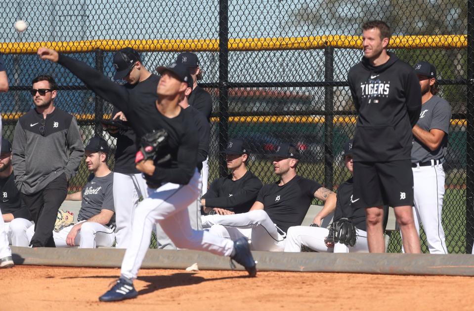 Detroit Tigers pitchers and catchers went through drills and a bullpen session during Spring Training Tuesday, February 14, 2023. Pitching coach Chris Fetter watches Matt Wisler throw during his bullpen session during practice.