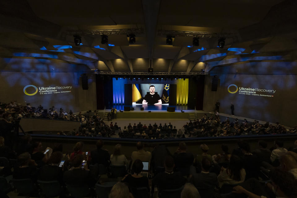 Ukrainian President Volodymyr Zelenskyy, delivers a speech by video conference during the Ukraine Recovery Conference URC, Monday, July 4, 2022 in Lugano, Switzerland. The URC is organised to initiate the political process for the recovery of Ukraine after the attack of Russia to its territory. (Alessandro della Valle/Keystone via AP)